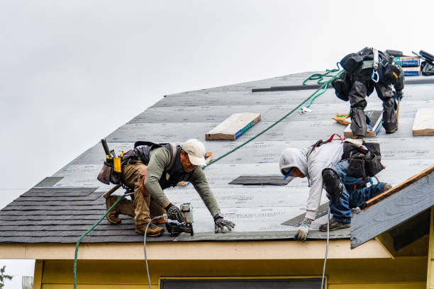 Professional Roofing technician working in Chester, MA